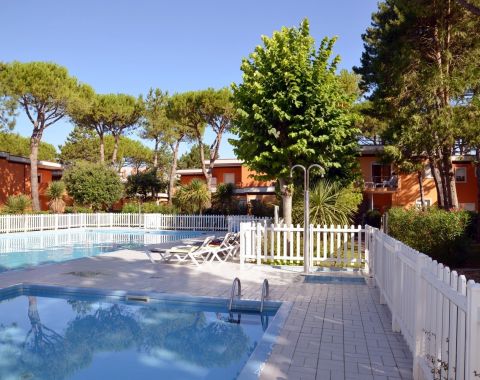 Three-room-apartment in a village with pool Bibione