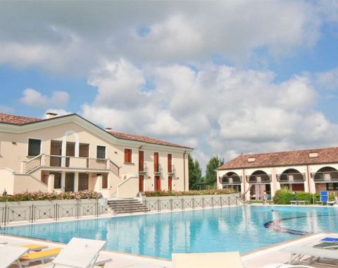 Villa con piscina a Lignano